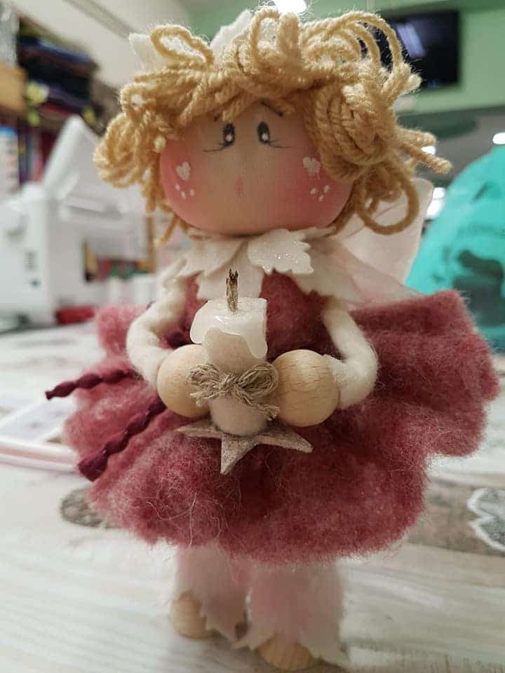 bambola di lana cardata